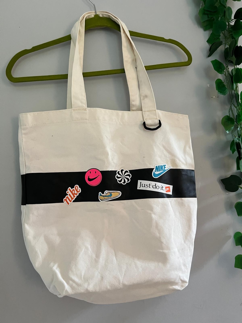 Nike Cream Canvas Tote with Black Stripe and Sticker Accents